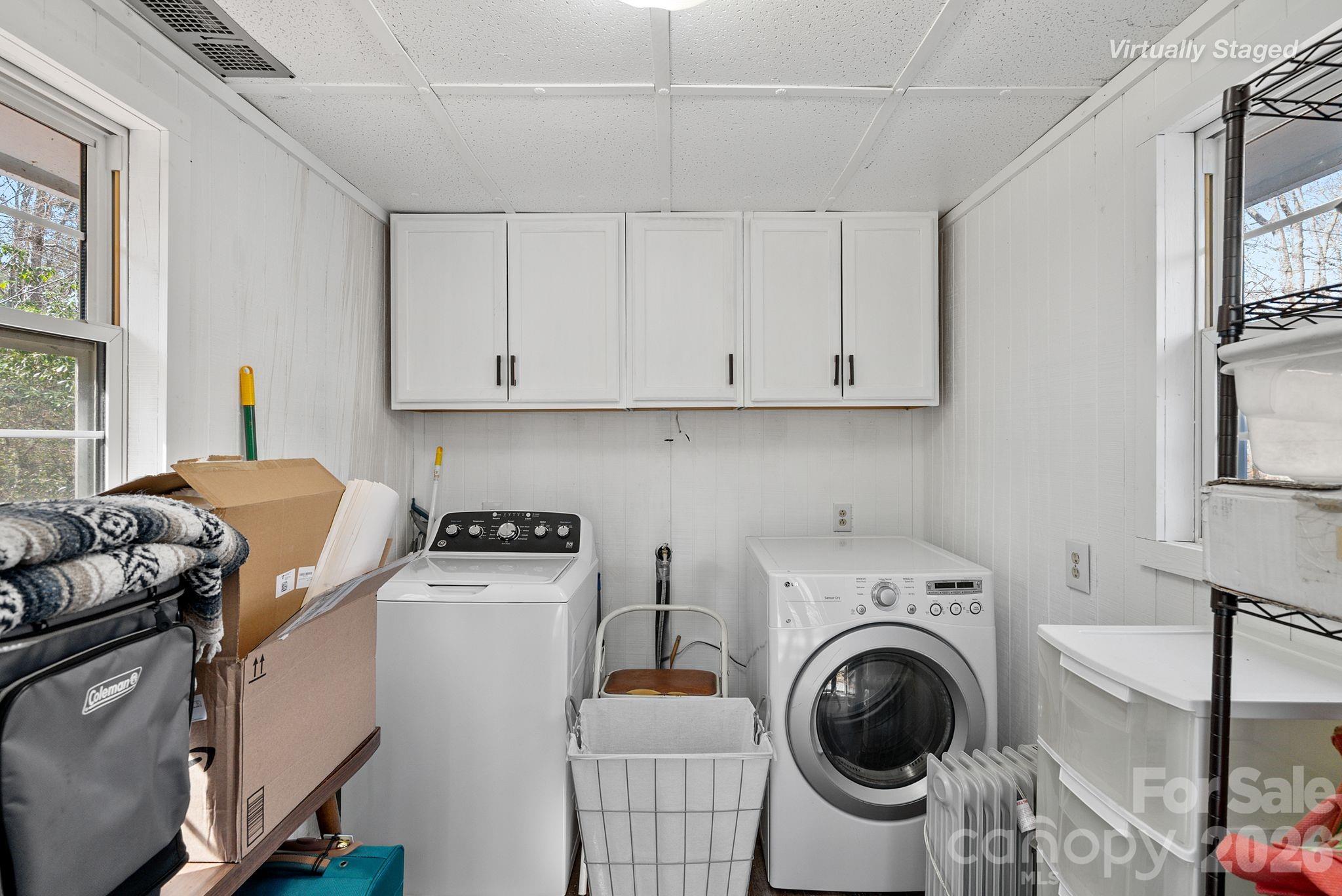 54 South Kimiko Lane Balsam Grove, NC 28708 - Photo 25 of 46 a utility room with sink dryer and washer