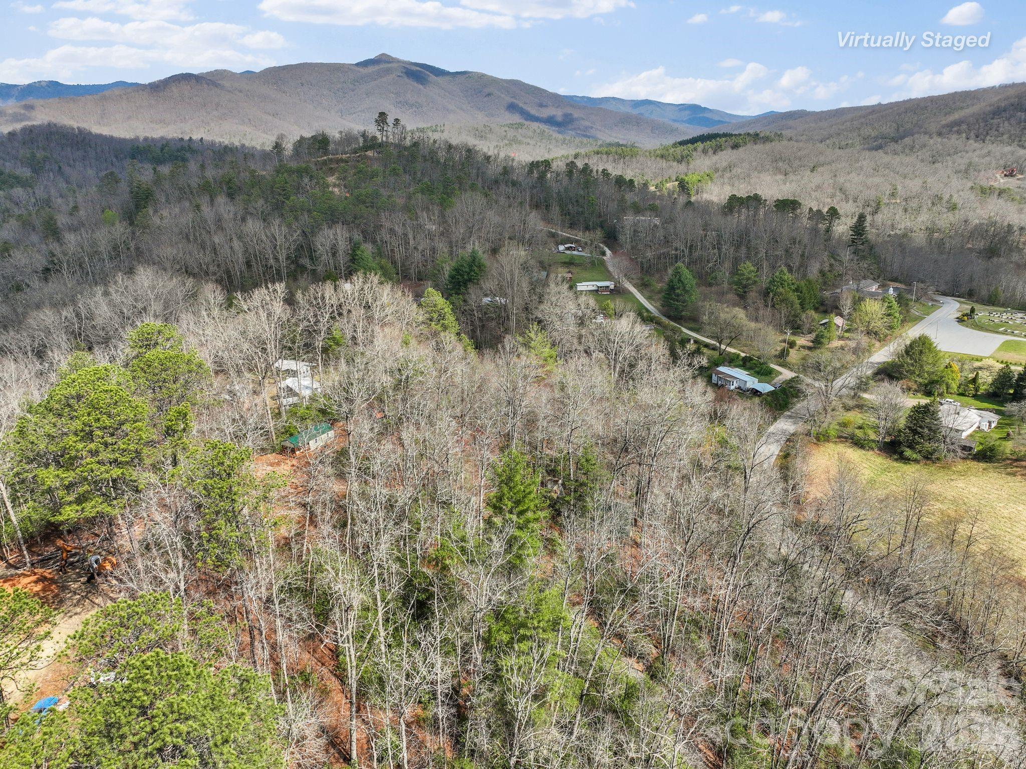 54 South Kimiko Lane Balsam Grove, NC 28708 - Photo 40 of 46 a view of a town with mountains in the background