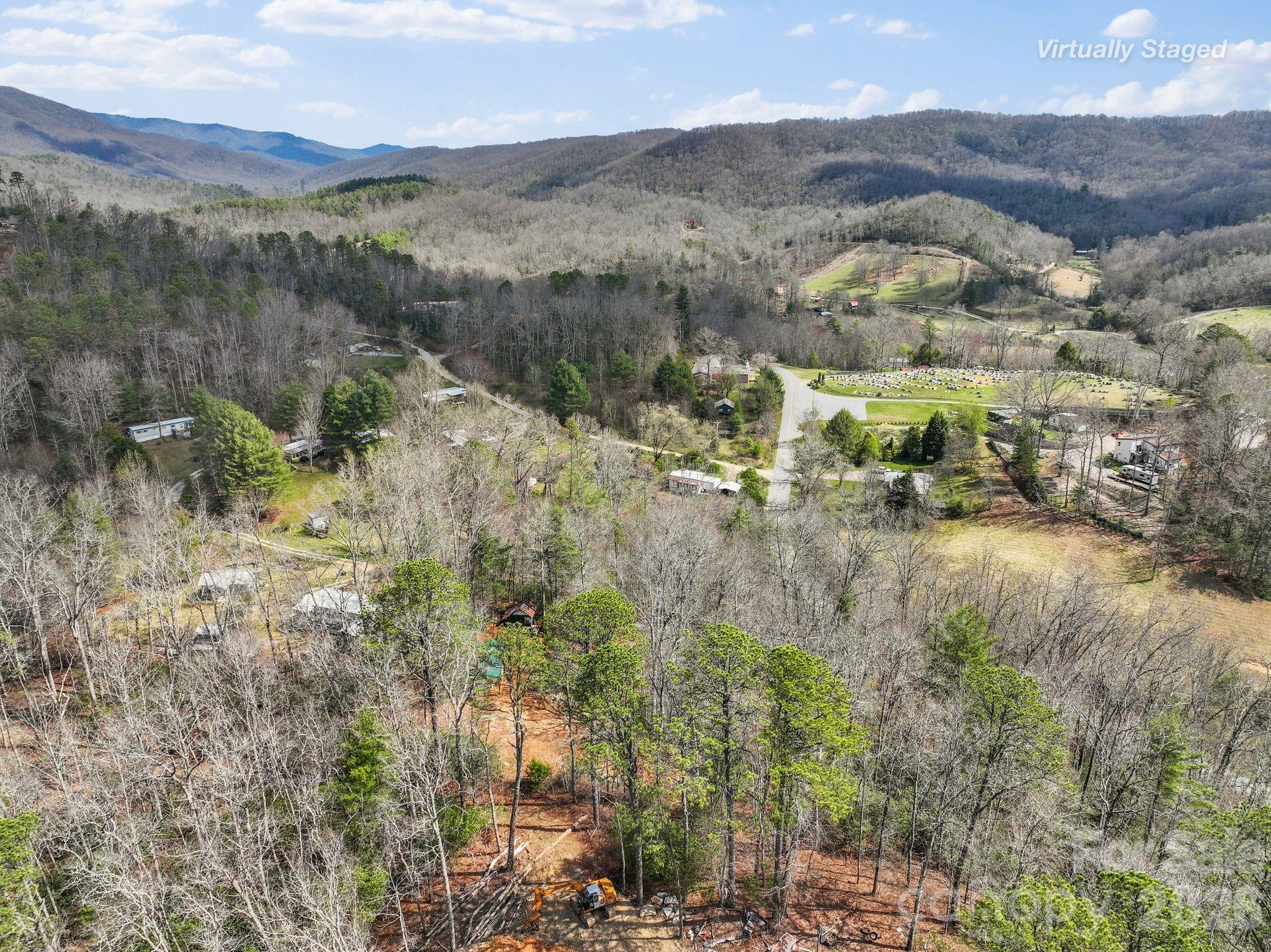 54 South Kimiko Lane Balsam Grove, NC 28708 - Photo 41 of 46 a view of a town with mountains in the background