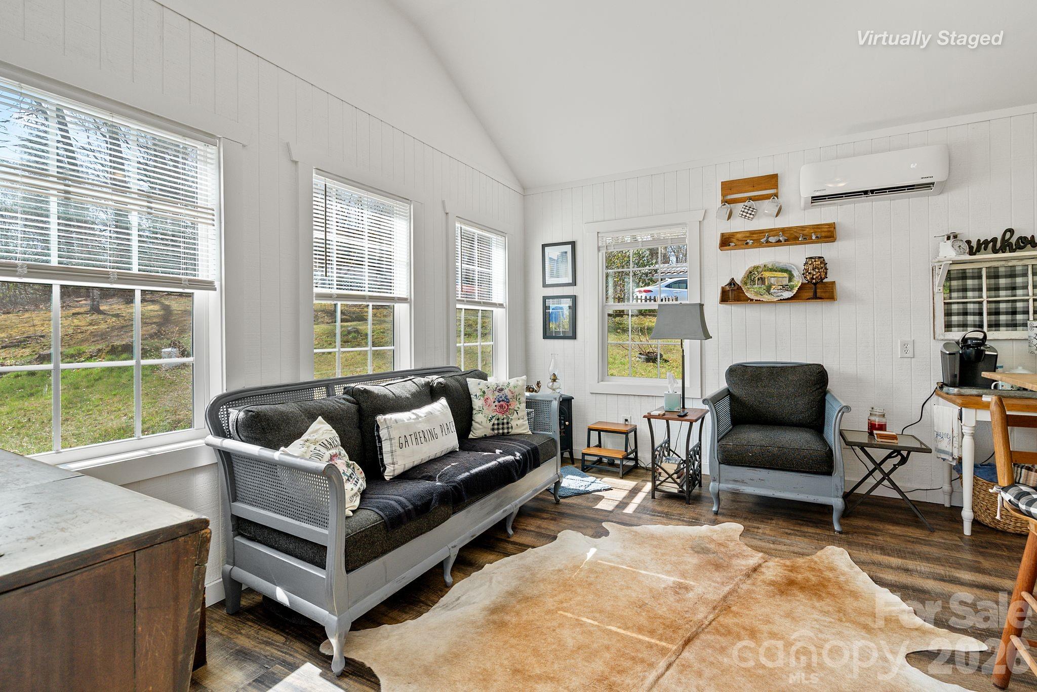 54 South Kimiko Lane Balsam Grove, NC 28708 - Photo 7 of 46 a living room with furniture and a large window