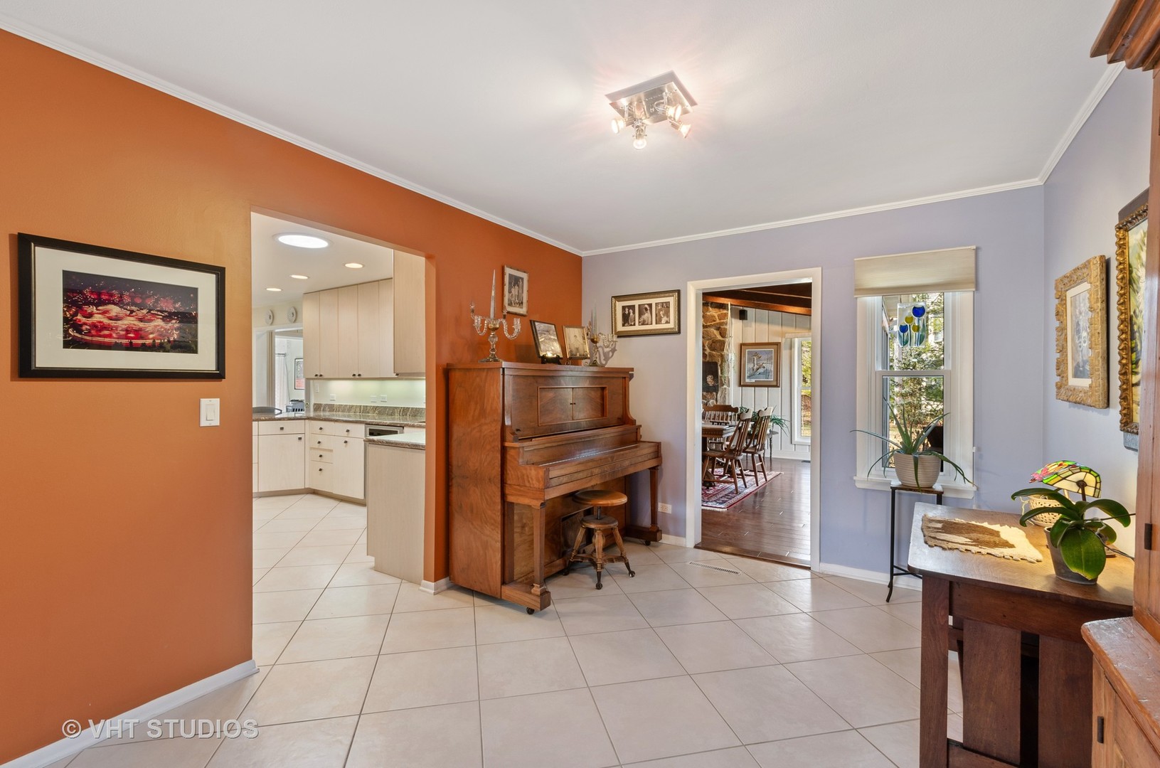 1246 Ridge Road Highland Park, IL 60035 - Photo 2 of 22 a living room with furniture and a refrigerator
