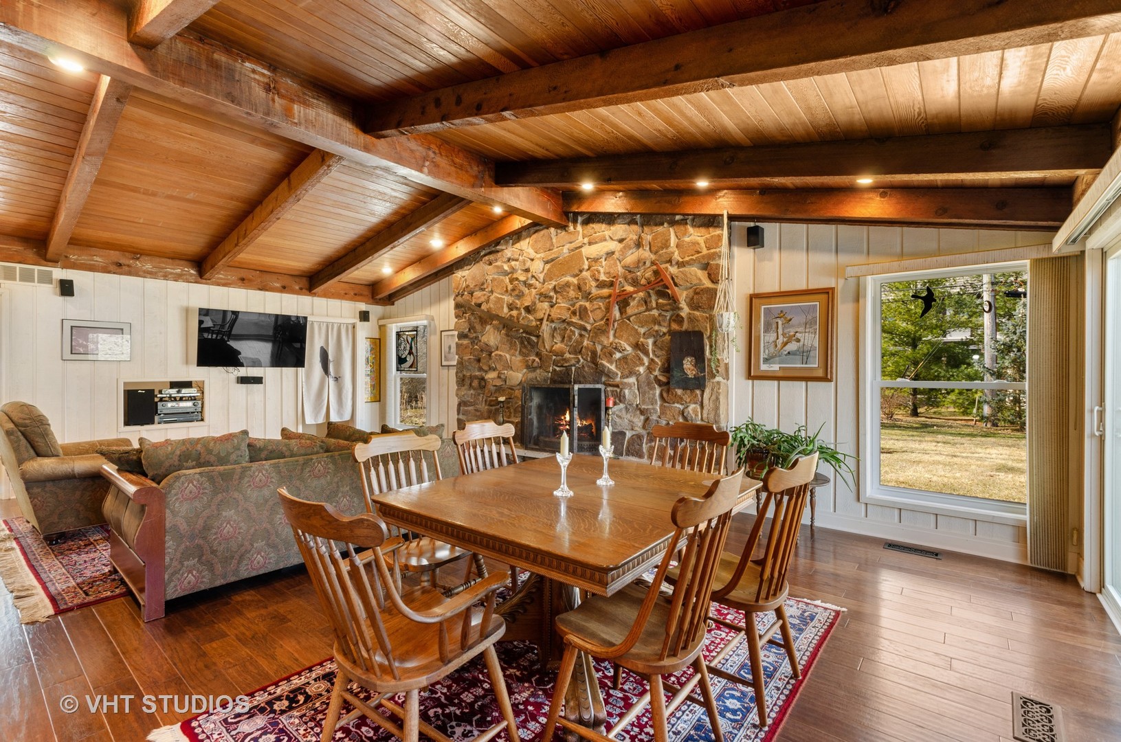 1246 Ridge Road Highland Park, IL 60035 - Photo 11 of 22 a dining room with furniture wooden floor and a chandelier