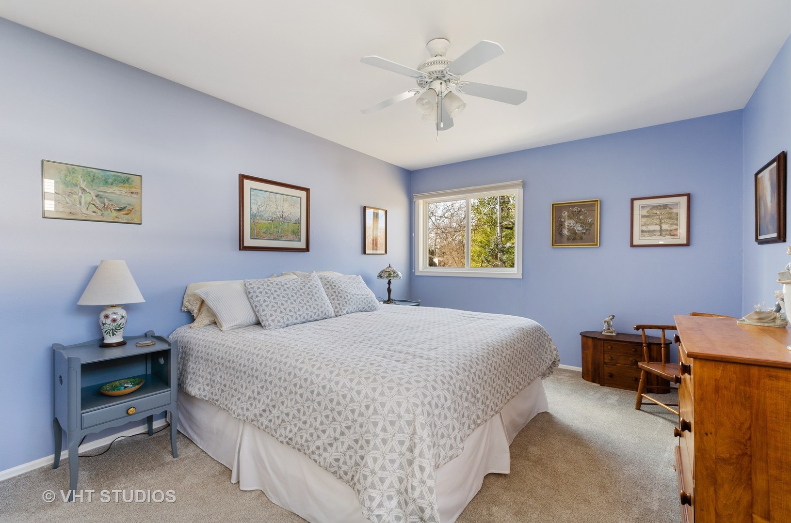 1246 Ridge Road Highland Park, IL 60035 - Photo 14 of 22 a bedroom with a bed and a chandelier