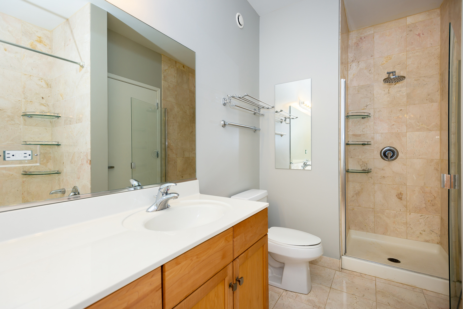 1101 South State Street, Unit 1804 Chicago, IL 60605 - Photo 16 of 29 a bathroom with a sink a toilet and shower