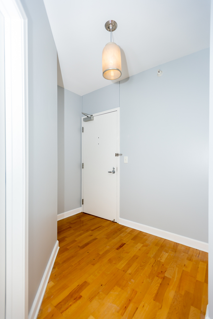 1101 South State Street, Unit 1804 Chicago, IL 60605 - Photo 21 of 29 a view of empty room