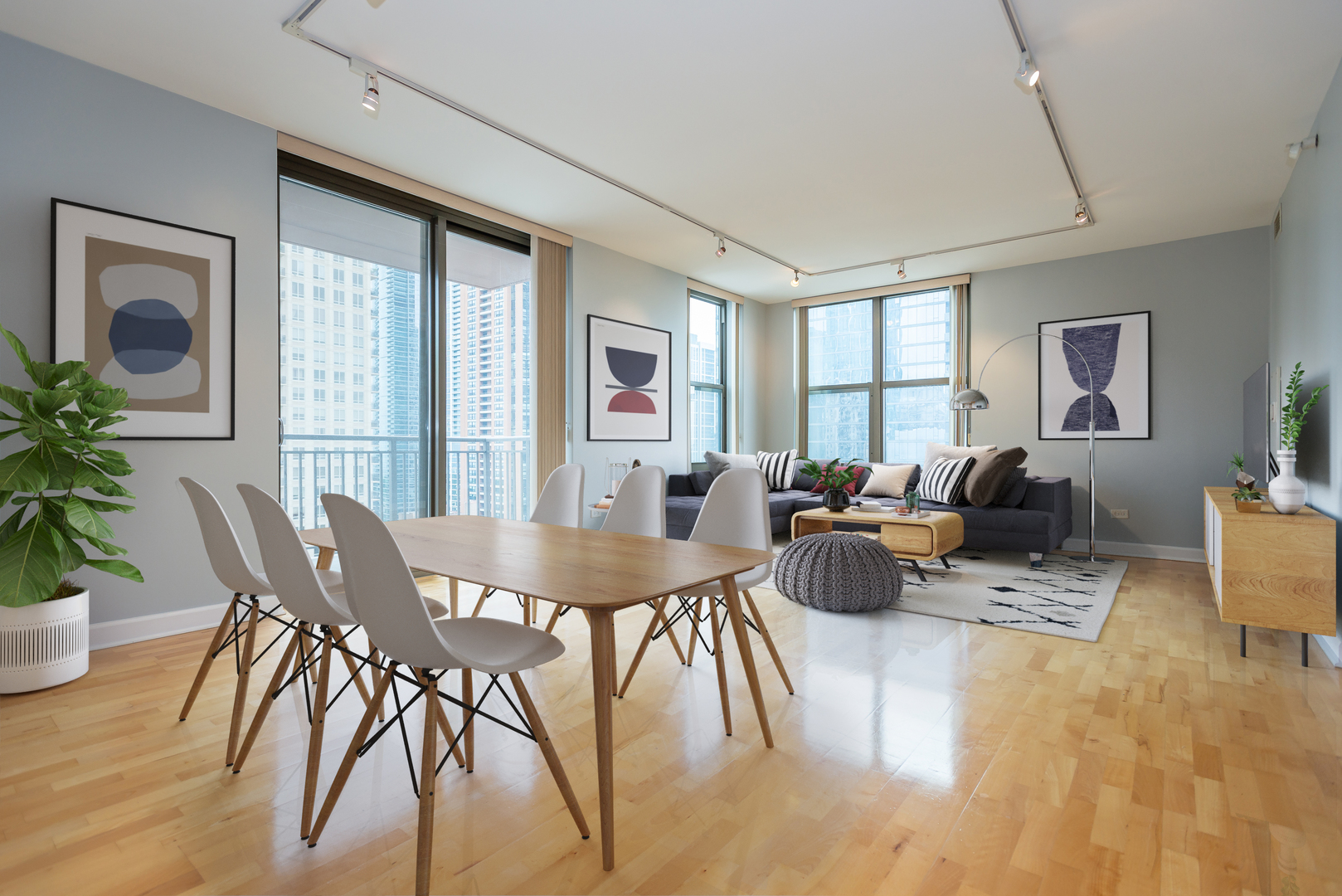 1101 South State Street, Unit 1804 Chicago, IL 60605 - Photo 3 of 29 a view of a dining room with furniture window and wooden floor