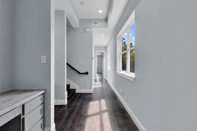 a view of hallway with stairs