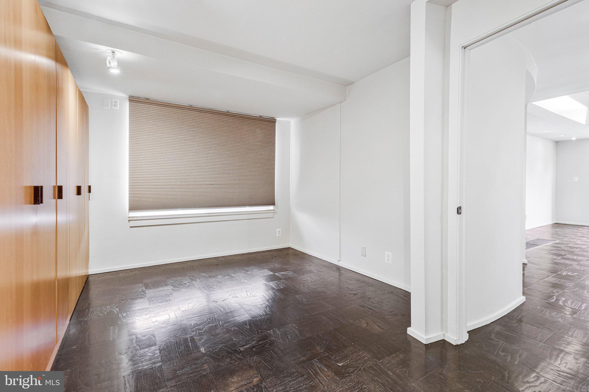 510 N Street Southwest, Unit N622 Washington, DC 20024 - Photo 11 of 29 a view of empty room with wooden floor and fan