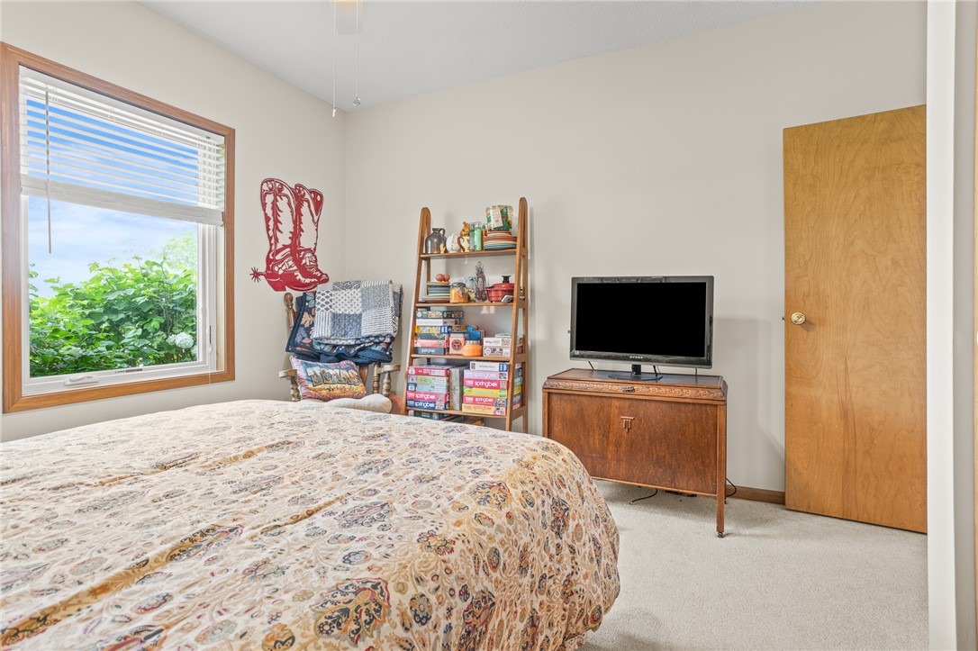 4222 Ramsey Road Springfield, OH 45502 - Photo 57 of 79 This inviting bedroom features ample natural light and plush carpeting for ultimate comfort.