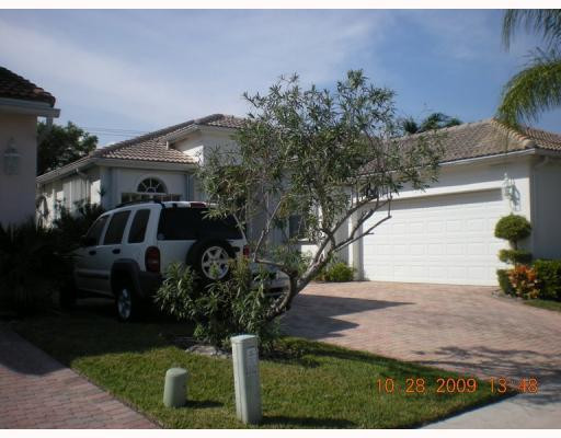 7141 Northwest Turtle Walk Boca Raton, FL 33487 - Photo 1 of 9 Exterior Front