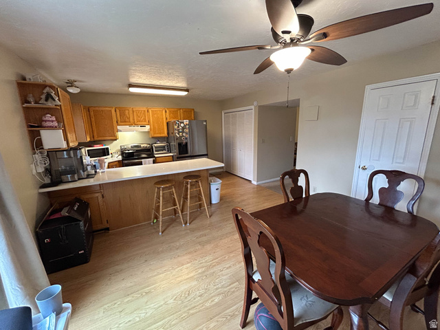 939 South Freedom Boulevard, Unit 13 Provo, UT 84601 - Photo 10 of 26 Dining space featuring light wood finished floors and a ceiling fan