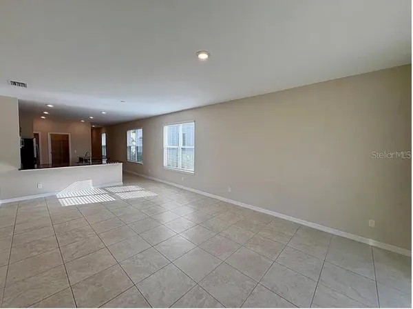 a view of an empty room and window