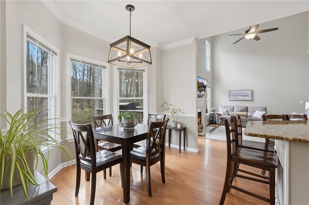60 Gilbert Circle Northeast Suwanee, GA 30024 - Photo 13 of 47 a view of a dining room with furniture window and outside view