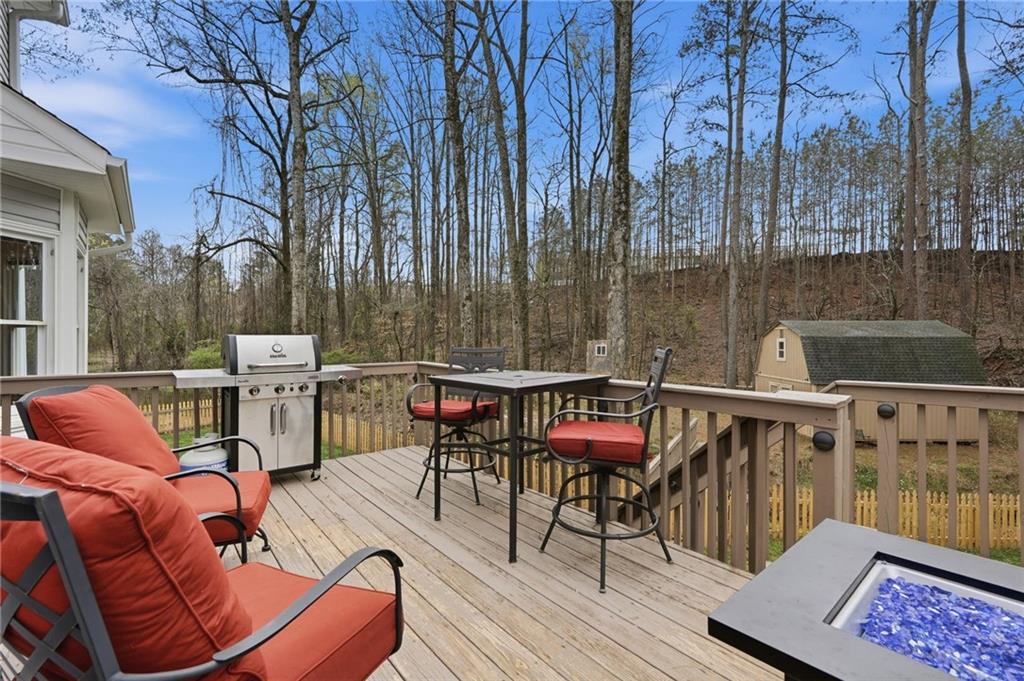60 Gilbert Circle Northeast Suwanee, GA 30024 - Photo 15 of 47 a balcony with furniture and outdoor space