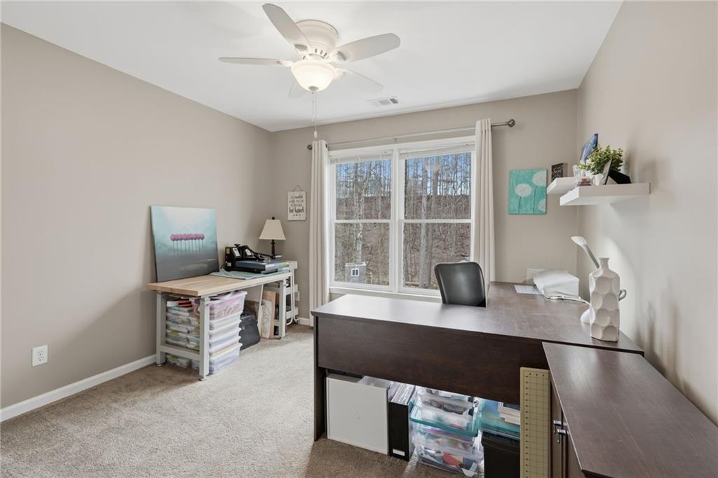 60 Gilbert Circle Northeast Suwanee, GA 30024 - Photo 22 of 47 a workspace with furniture and window