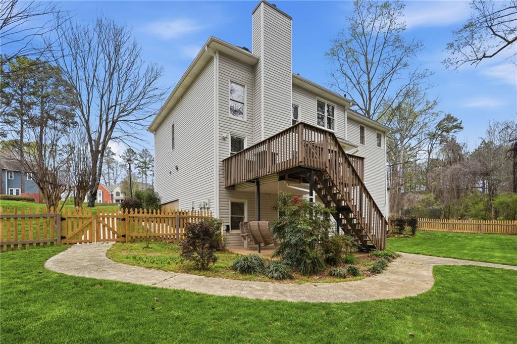 60 Gilbert Circle Northeast Suwanee, GA 30024 - Photo 34 of 47 a view of a house with a yard