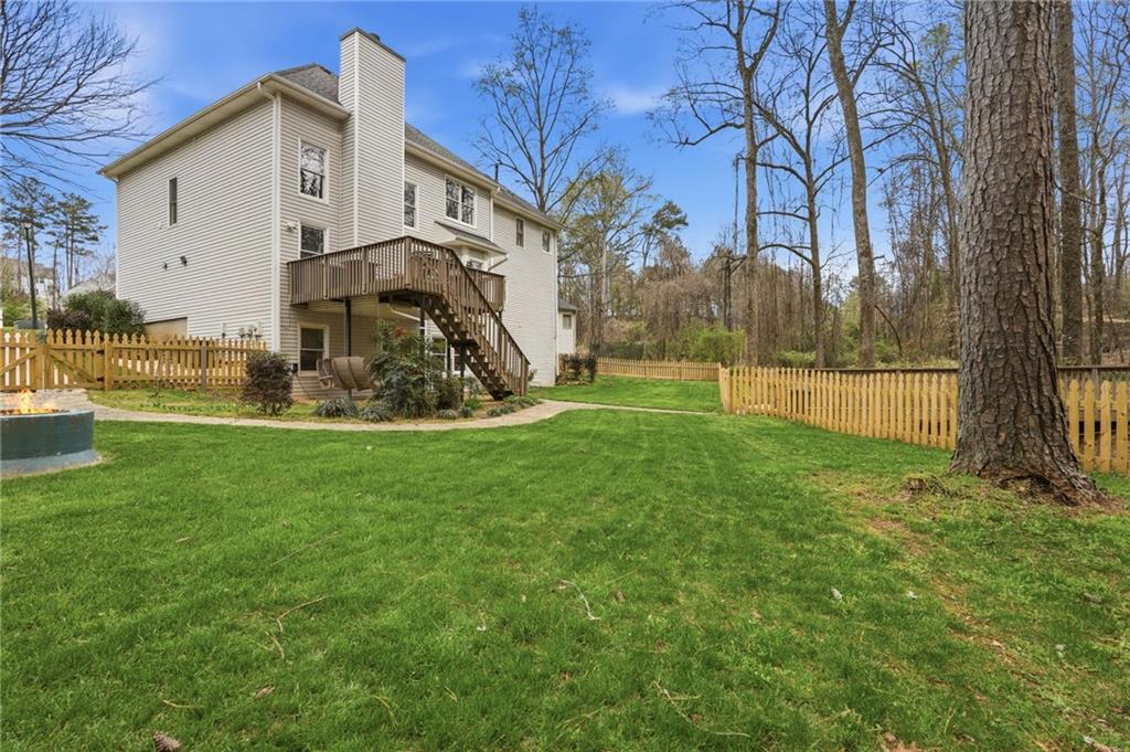 60 Gilbert Circle Northeast Suwanee, GA 30024 - Photo 35 of 47 a view of a house with a yard