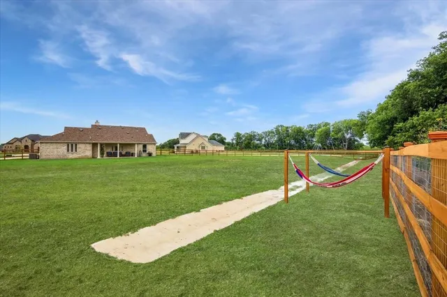 a view of a golf course with a garden