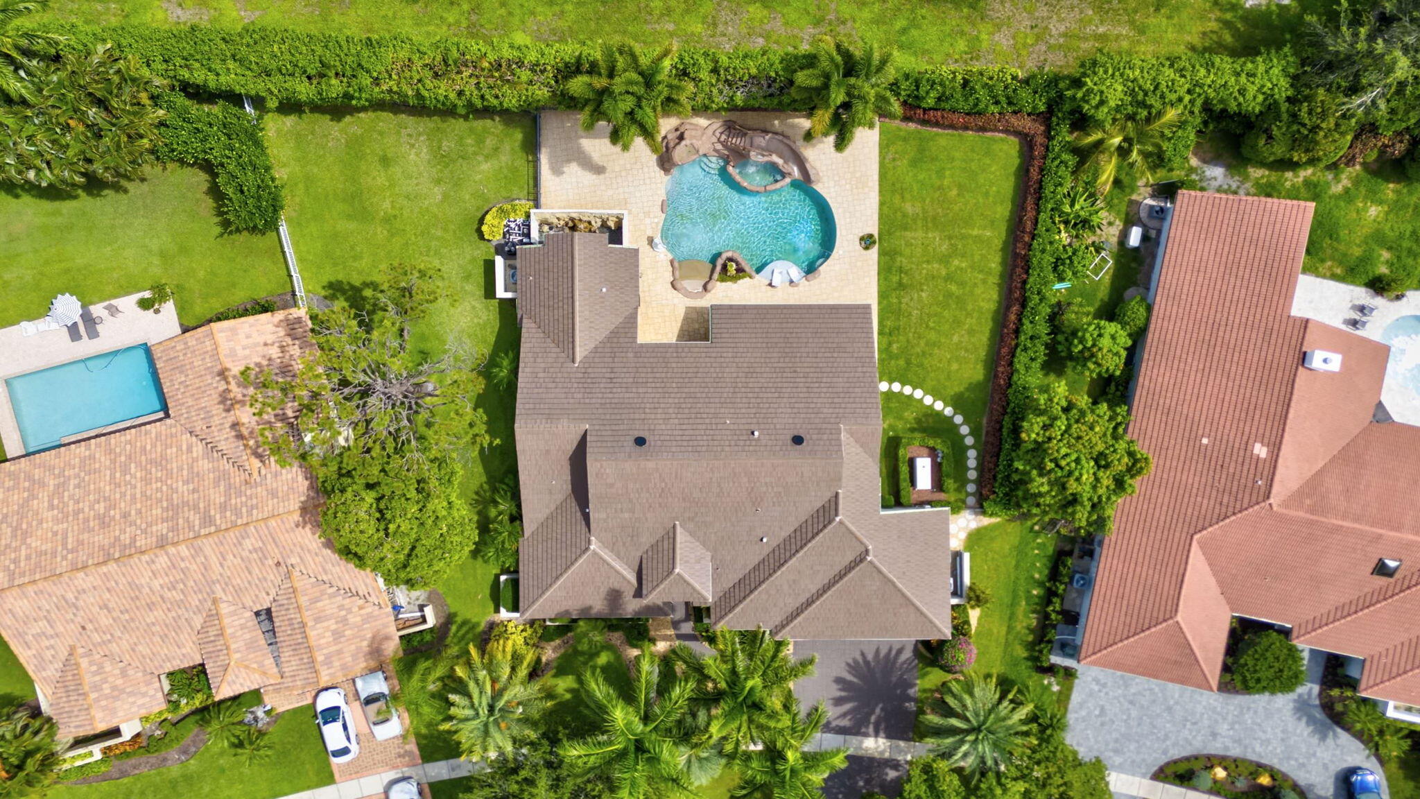 4445 Woodfield Boulevard Boca Raton, FL 33434 - Photo 2 of 56 3-web-or-mls-DJI_20240708110454_0143_DAn