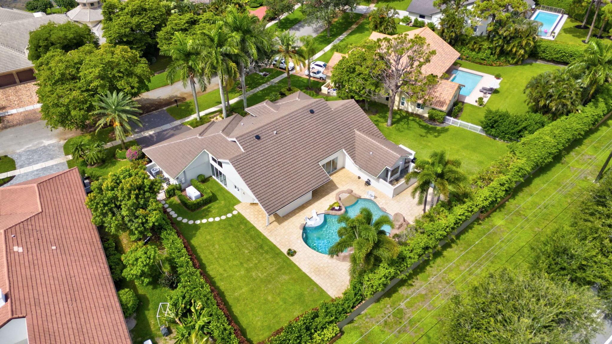4445 Woodfield Boulevard Boca Raton, FL 33434 - Photo 5 of 56 8-web-or-mls-DJI_20240708110559_0161_D_2