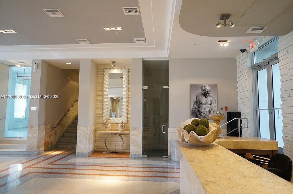 435 21st Street, Unit 215 Miami Beach, FL 33139 - Photo 14 of 14 a view of living room and front door