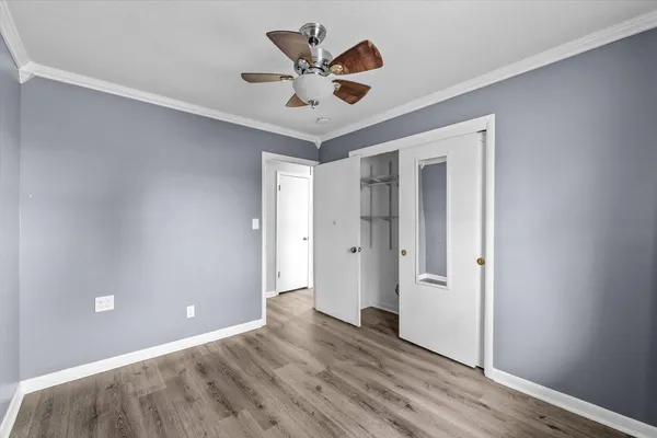 a view of an empty room and window