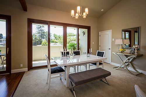 500 Almer Road, Unit 309 Burlingame, CA 94010 - Photo 5 of 20 a view of a dining room with furniture window and outside view