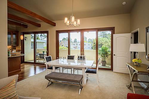 500 Almer Road, Unit 309 Burlingame, CA 94010 - Photo 7 of 20 a living room with furniture and a chandelier