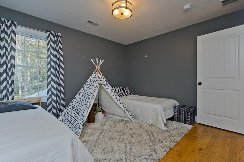 75 Moose Brook Road Southampton, MA 01073 - Photo 26 of 38 a bedroom with a bed and a window