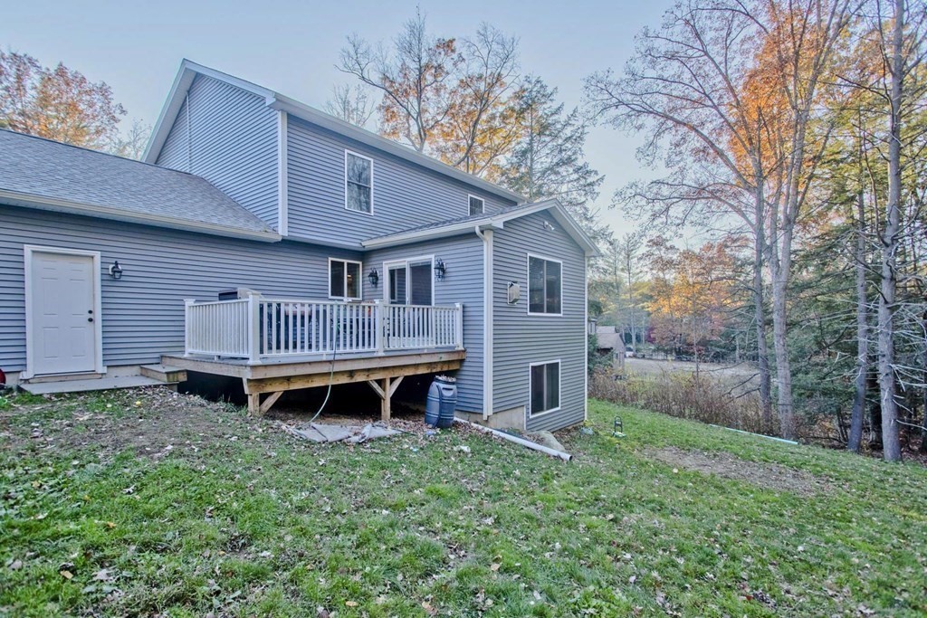 75 Moose Brook Road Southampton, MA 01073 - Photo 4 of 38 a backyard of a house with table and chairs