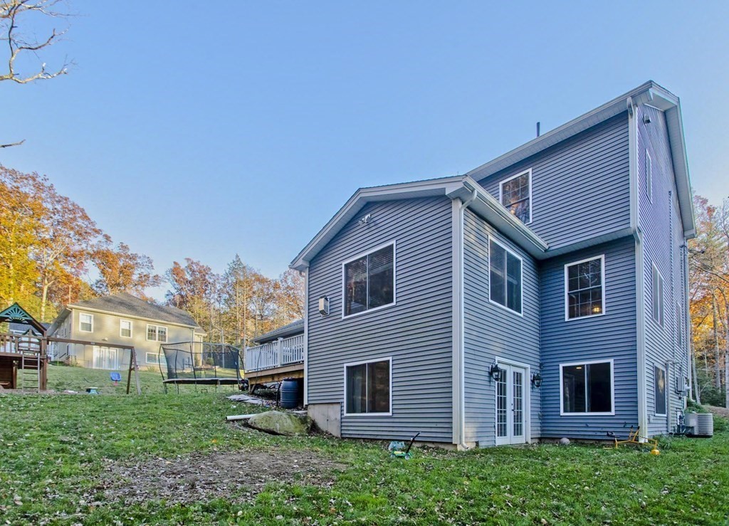 75 Moose Brook Road Southampton, MA 01073 - Photo 5 of 38 a front view of a house with a yard