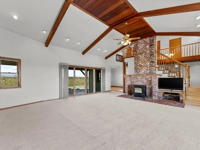 a kitchen that has a lot of cabinets and refrigerator