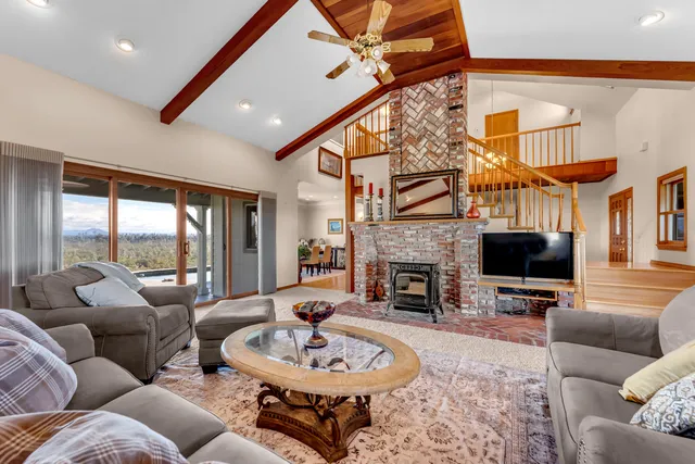 a kitchen with stainless steel appliances granite countertop a stove and a refrigerator
