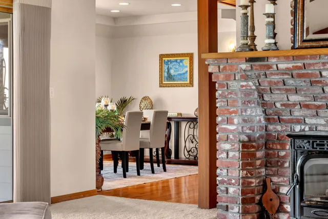 a spacious bedroom with a bed and a chandelier