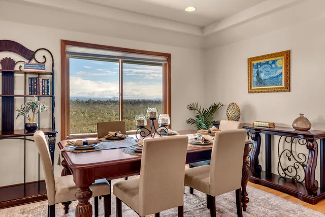 a view of entryway with stairs and a chandelier fan