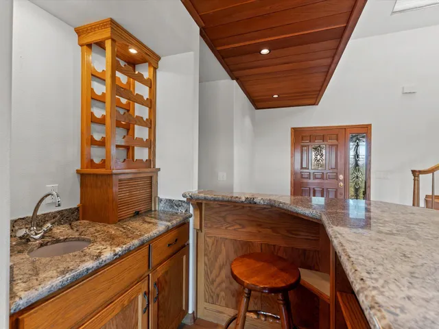 a bathroom with a tub and shower