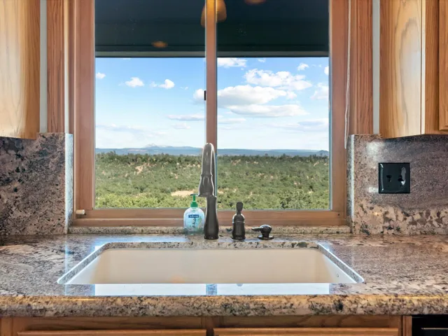 a view of hallway with livingroom