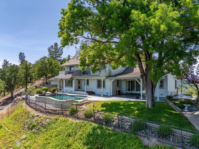 a view of a house with outdoor space and porch
