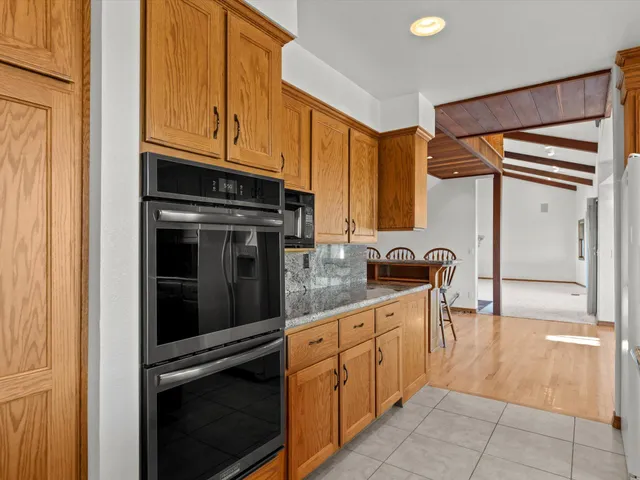 a view of balcony with wooden floor