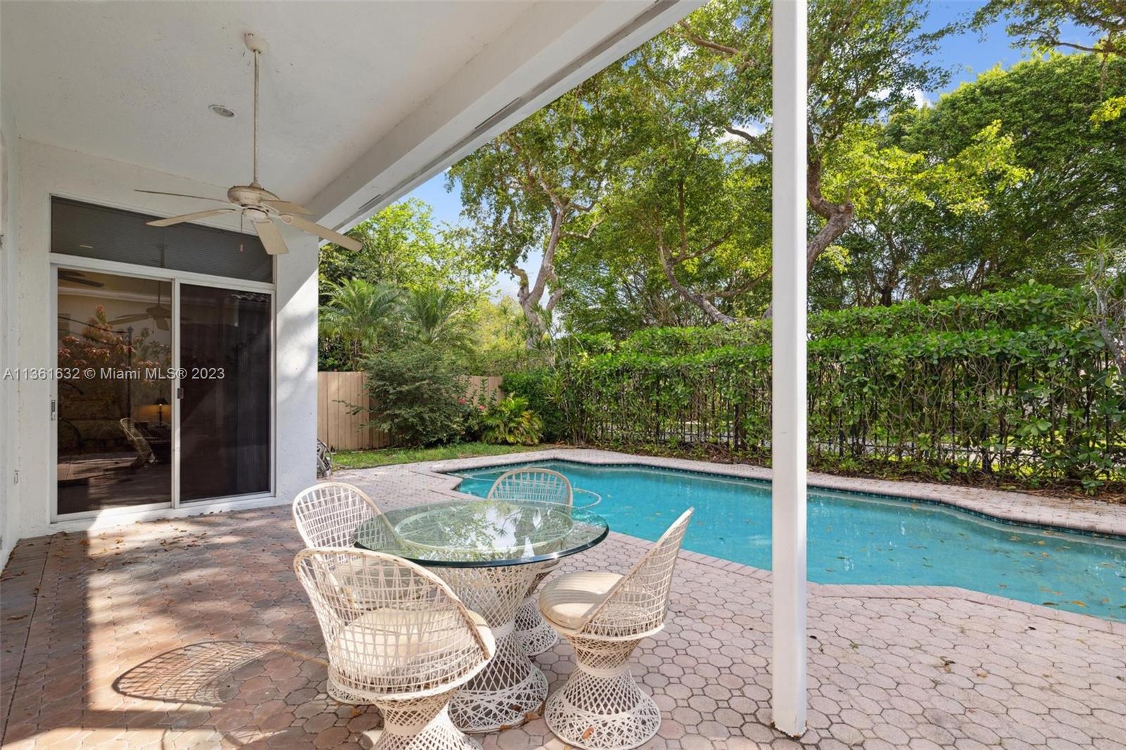 6666 Northwest 23rd Terrace Boca Raton, FL 33496 - Photo 21 of 38 a outdoor view with a seating space