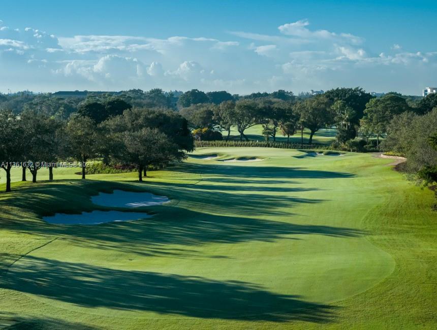 6666 Northwest 23rd Terrace Boca Raton, FL 33496 - Photo 33 of 38 a view of a golf course with a lake