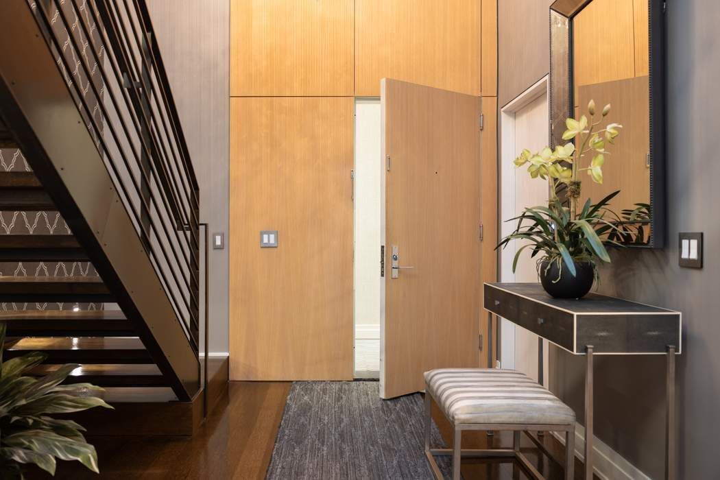 421 Hudson Street, Unit 420 Manhattan, NY 10014 - Photo 12 of 15 a view of entryway and hall with wooden floor
