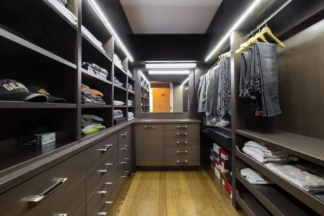 a kitchen with a refrigerator and window