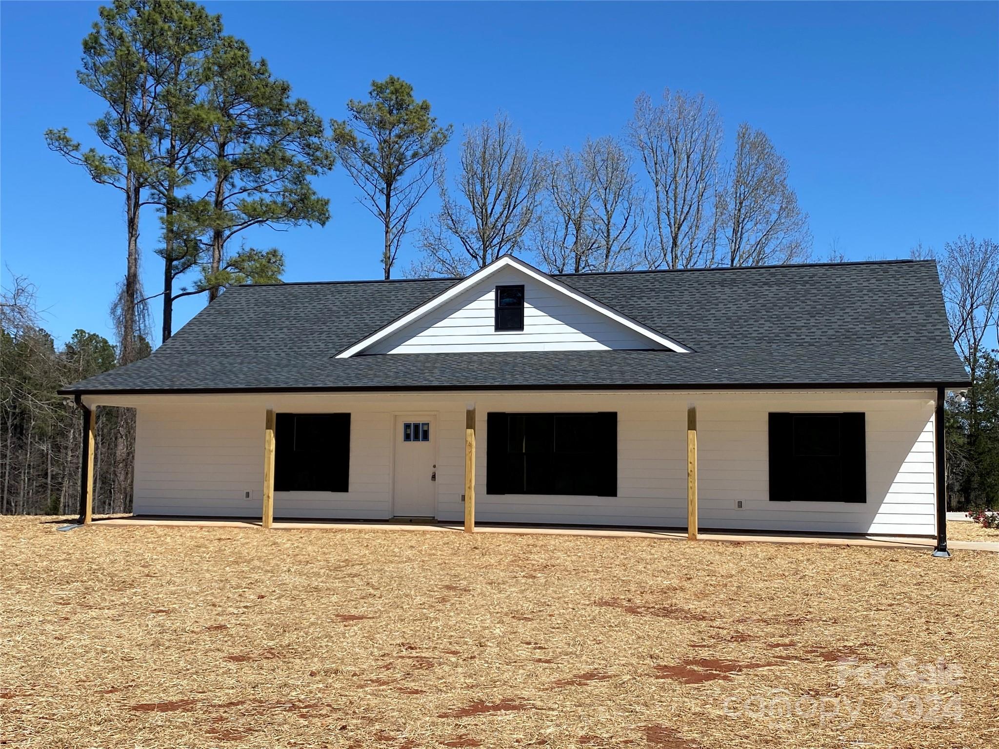 1741 Scenic View Road Hickory Grove, SC 29717 - Photo 1 of 11 a house with trees in front of it