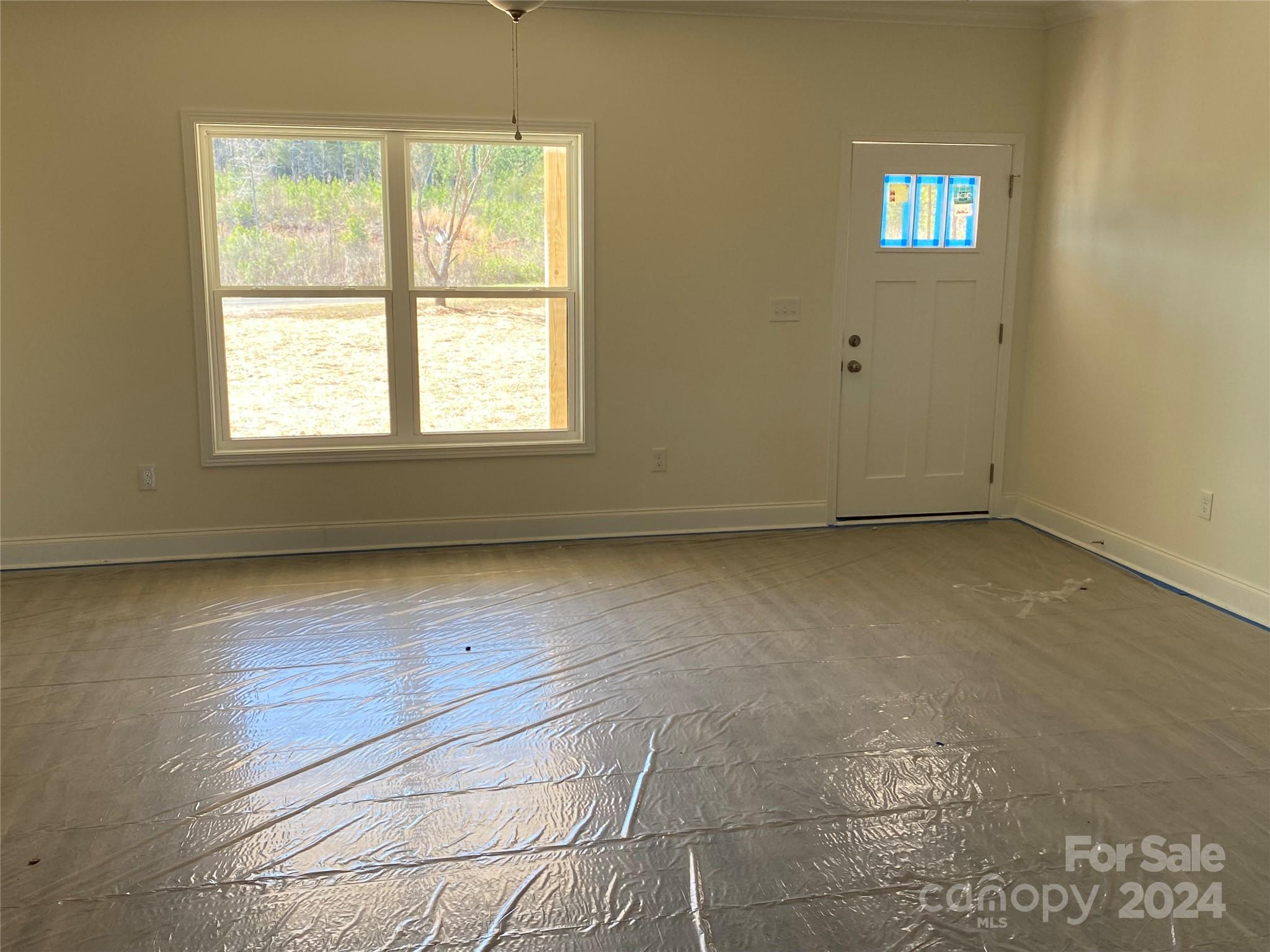 1741 Scenic View Road Hickory Grove, SC 29717 - Photo 4 of 11 an empty room with windows