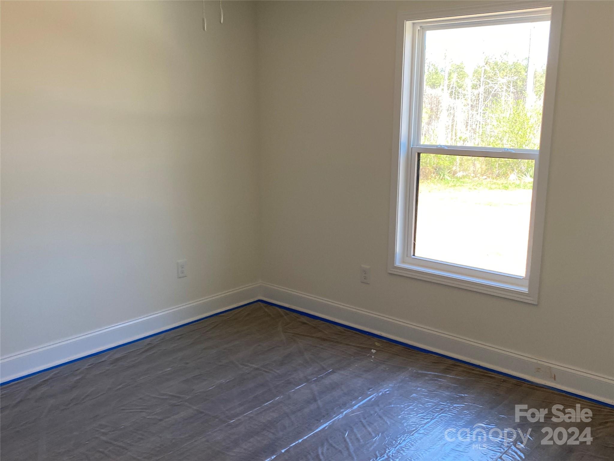 1741 Scenic View Road Hickory Grove, SC 29717 - Photo 7 of 11 an empty room with a window