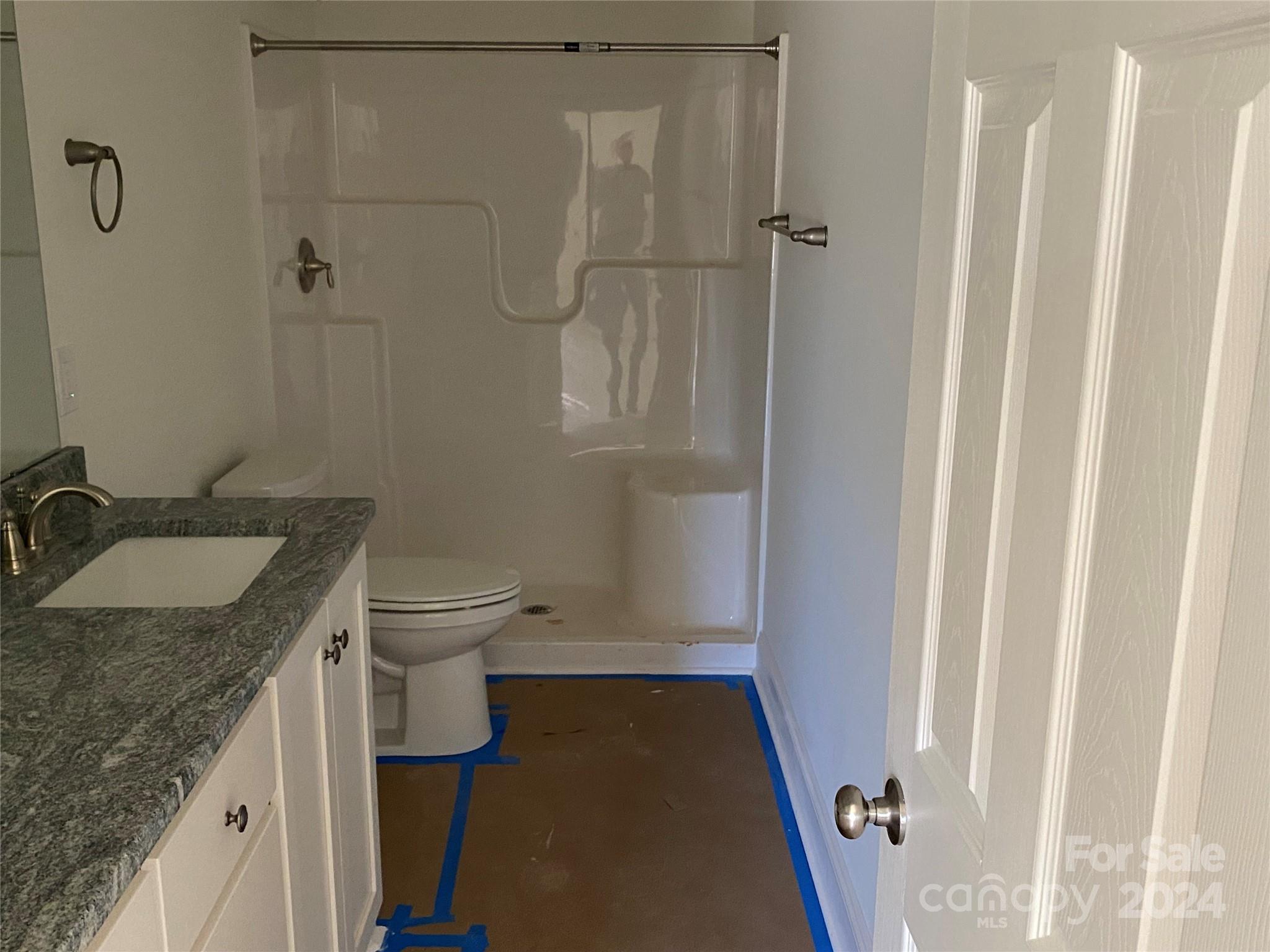 1741 Scenic View Road Hickory Grove, SC 29717 - Photo 8 of 11 a bathroom with a granite countertop sink toilet and shower