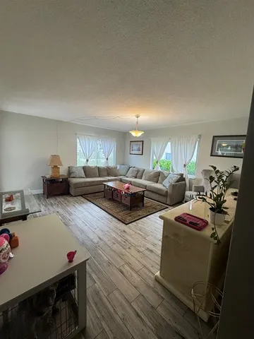 a bed room with two bed furniture and a window