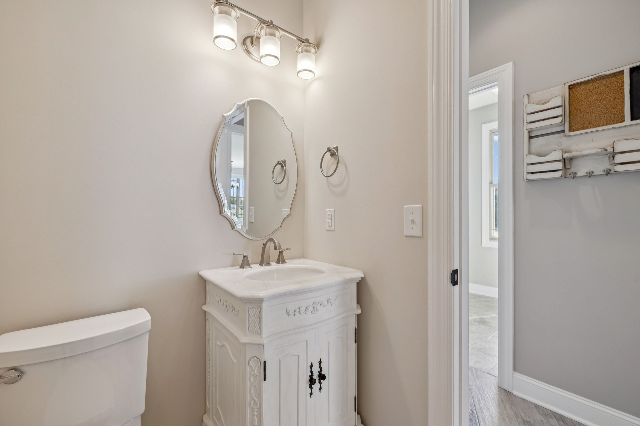 105 Barbara Spears Road Morrison, TN 37357 - Photo 17 of 55 a bathroom with a sink a toilet and a mirror