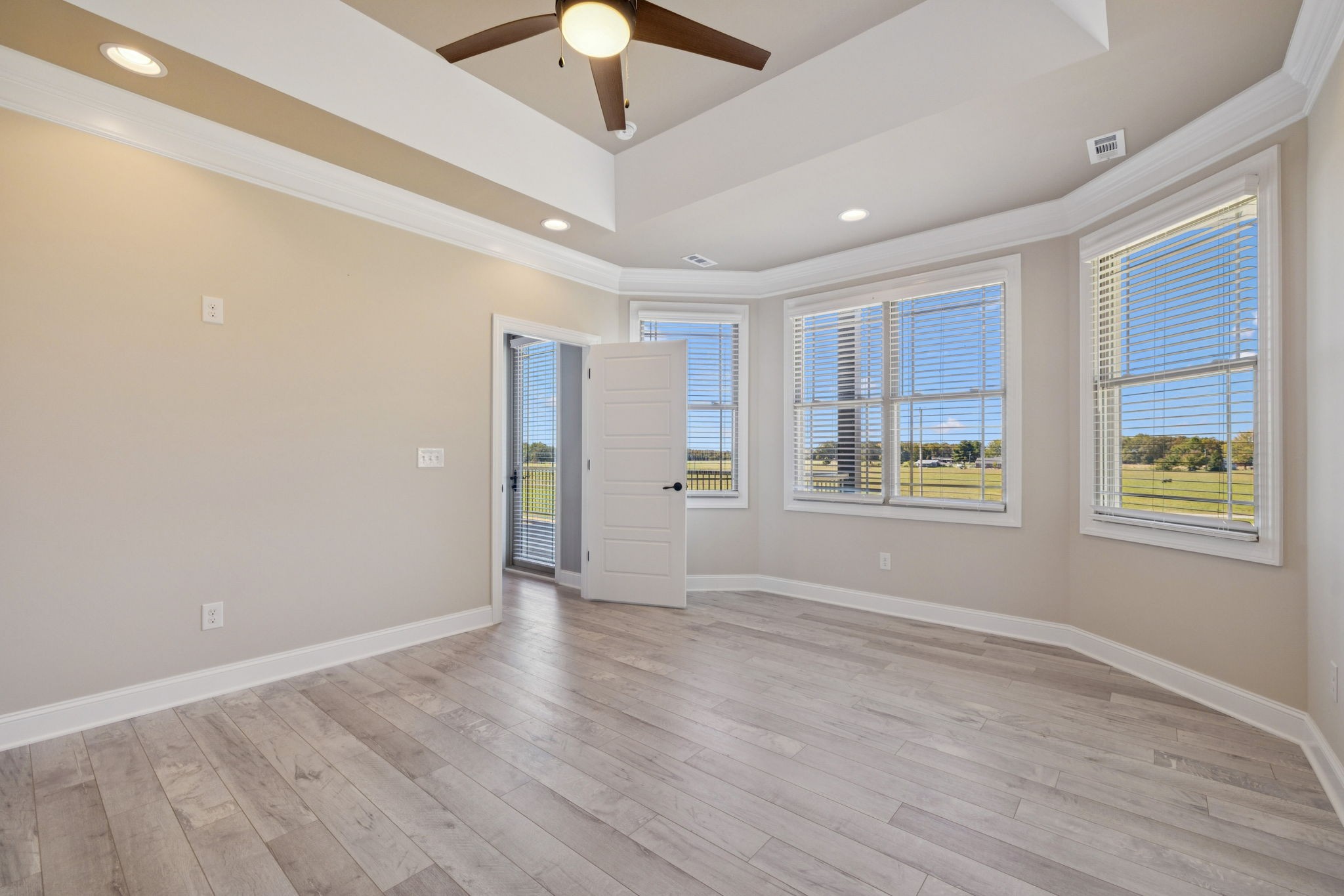 105 Barbara Spears Road Morrison, TN 37357 - Photo 21 of 55 a view of an empty room with a window and wooden floor